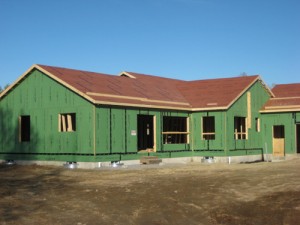 Pre-fabricated house with ZIP system sheathing