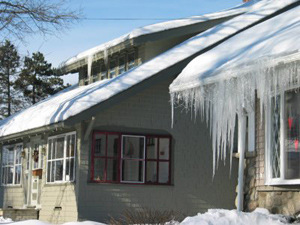 Ice dam on neighbor house