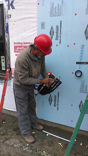 Installing Rigid Foam Board Insulation Over Tyvek House Wrap